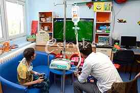 actor Milos Bikovic spending time with children at the Department of Oncology