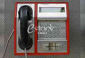 the public pay phone close up, phone and headset