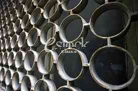 decorative iron window pattern, metal protection on the window, Metal net circle texture background networks with holes