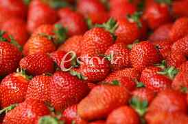Strawberry fresh natural juicy strawberries to background on the street market
