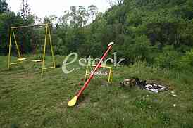 Playground at country side with swings and seesaw