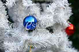 White Christmas tree with colorful ornaments